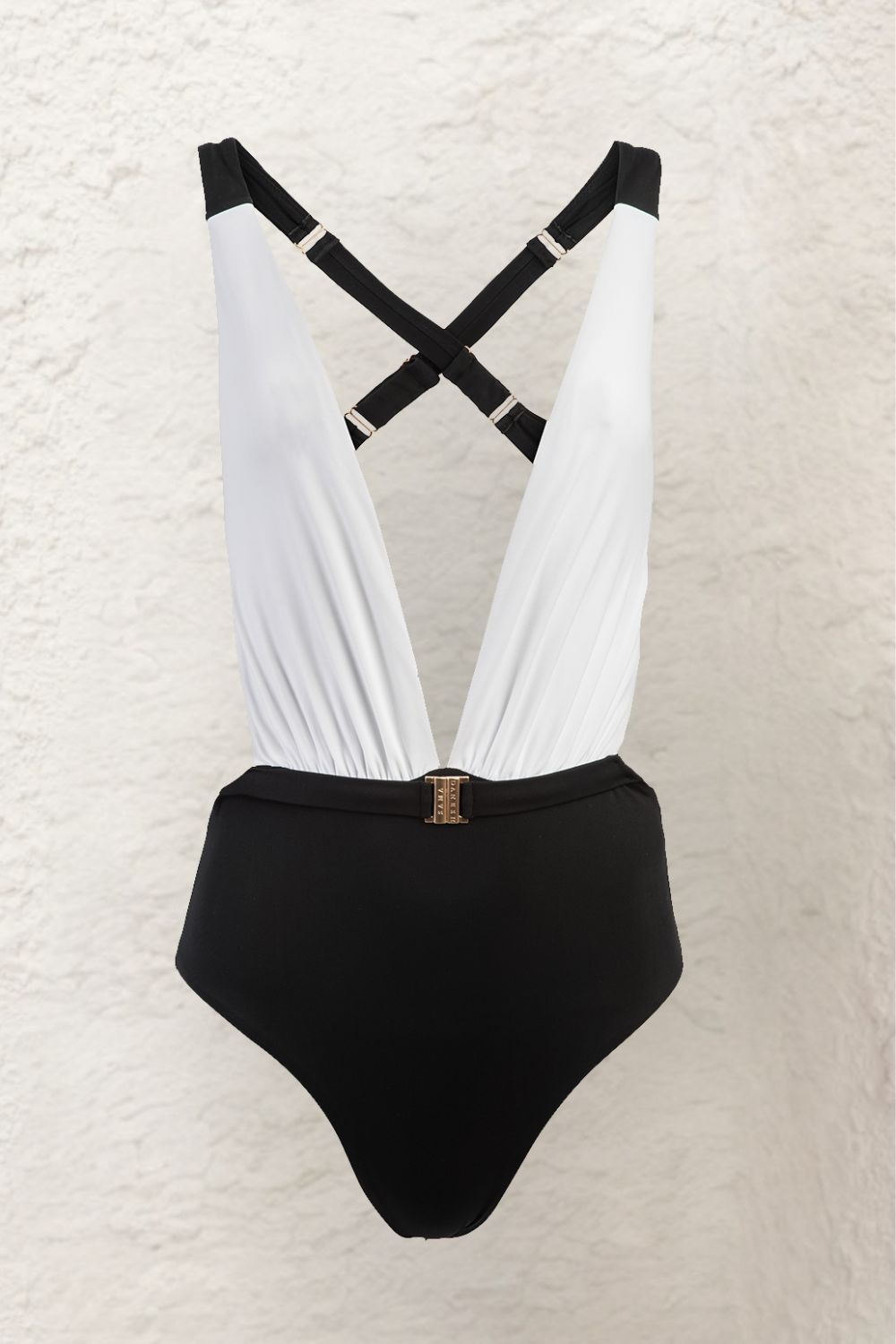 Front view of a cut out swimsuit in Monochrome colours that accentuates the waist