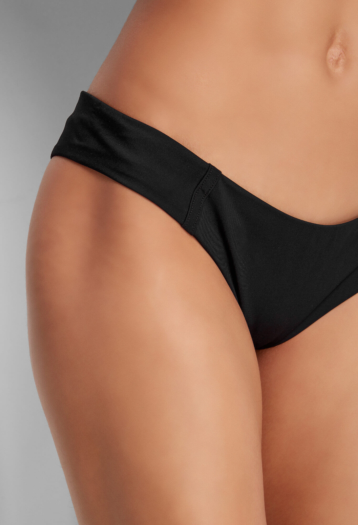 a closeup of a brazillian black bikini
